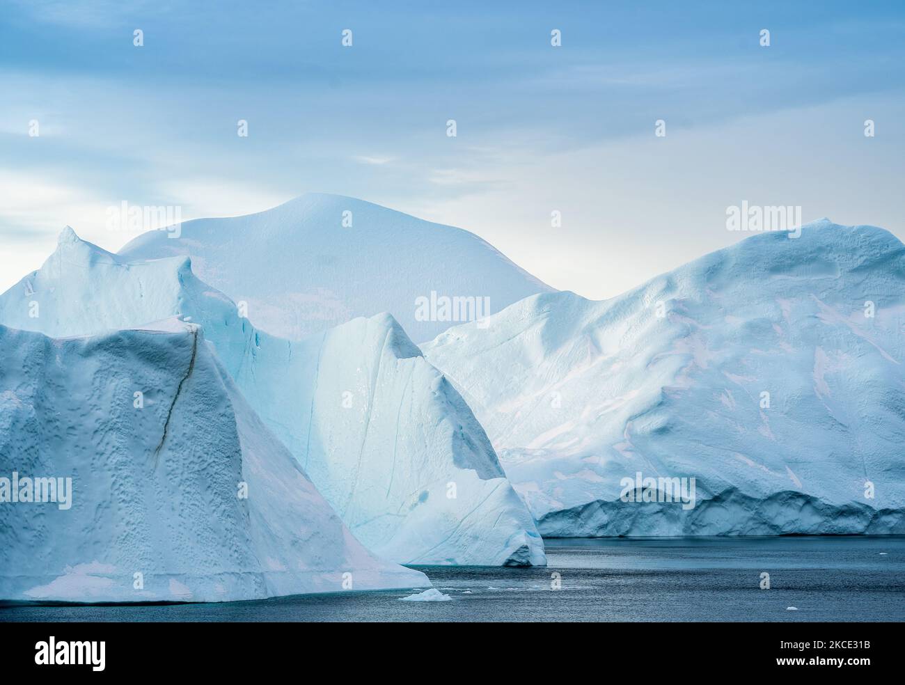 Icebergs near Ilulissat, Greenland. Climate change is having a profound ...