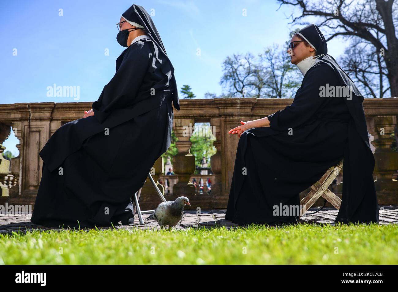 Nuns attend the ceremony commemorating St. Stanislaus at Church on the Rock in Krakow, Poland on May 9, 2021. Each year on the first Sunday following May 8, a procession honoring Stanislaus of Szczepanow, a Polish bishop and martyr (1030-1079), walks through the streets of Krakow carring relics of saints and blessed. This year, due to the coronavirus pandemic, the procession was cancelled but faithful may attend the Holy Mass celebrated outdoors with the participation of the Polish Episcopate. (Photo by Beata Zawrzel/NurPhoto) Stock Photo