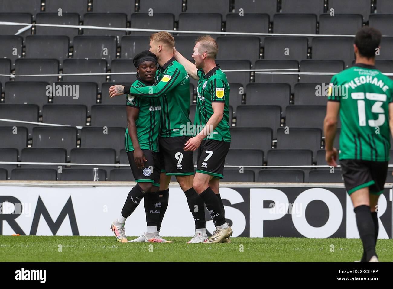 Stephen Humphrys celebrates with team mates after scoring for Rochdale, to extend their lead to make it 3 - 0 against Milton Keynes Dons, during the Sky Bet League One match between MK Dons and Rochdale at Stadium MK, Milton Keynes, UK on 9th May 2021. (Photo by John Cripps/MI News/NurPhoto) Stock Photo