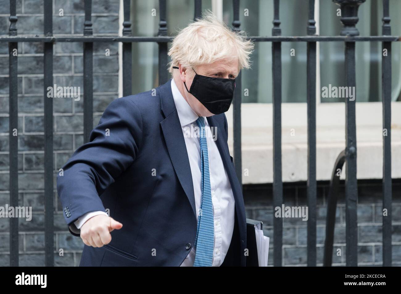 LONDON, UNITED KINGDOM - MAY 12, 2021: British Prime Minister Boris Johnson leaves 10 Downing Street for the House of Commons to give MPs an update on Covid-19 and lifting restrictions in England ahead of the second day Queen's Speech debate, on 12 May, 2021 in London, England. (Photo by WIktor Szymanowicz/NurPhoto) Stock Photo