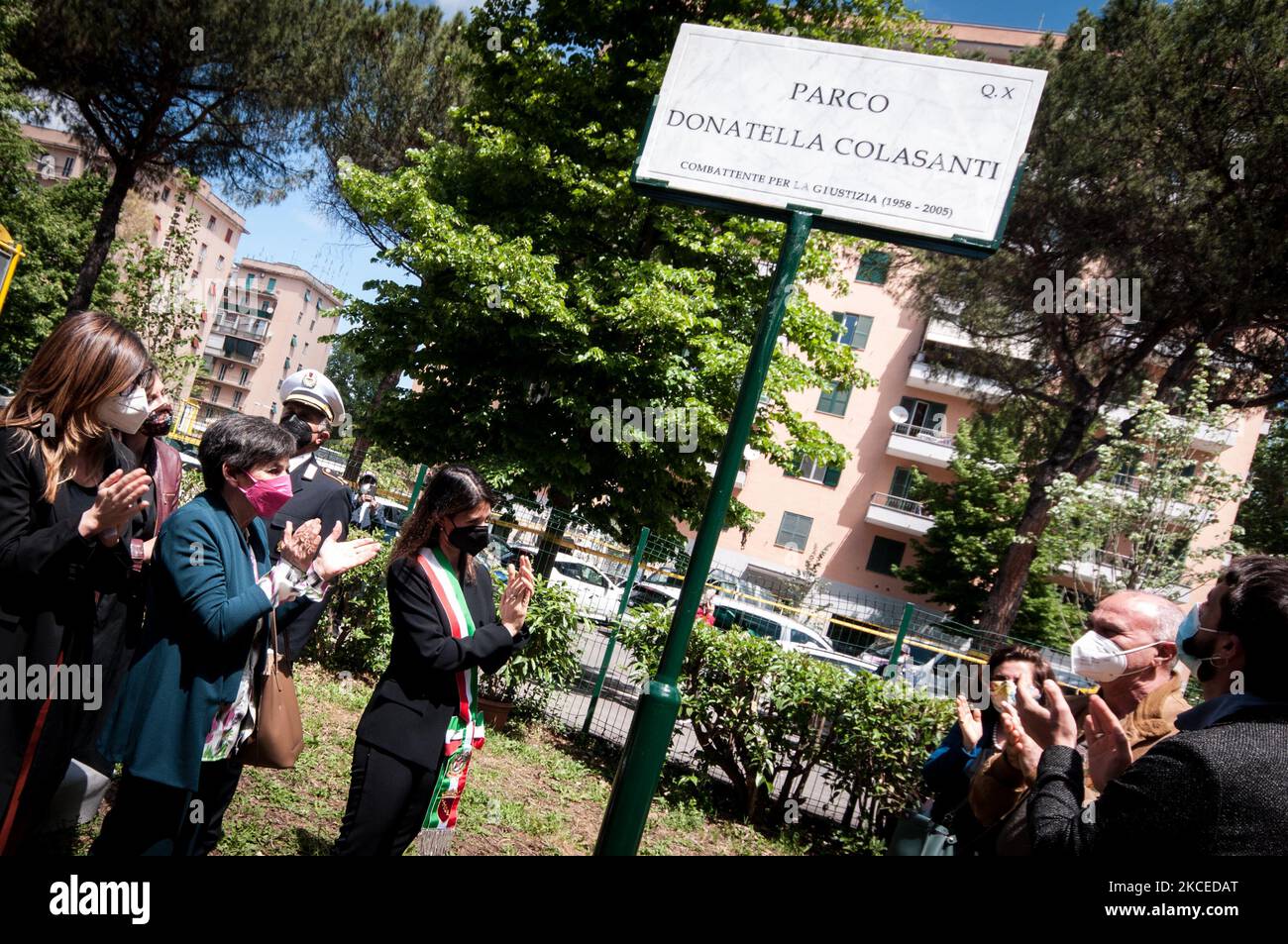 Rome's Mayor Virginia Raggi Virginia, Amedeo Ciaccheri and Roberto Colasanti during the ceremony of inauguration park in memory of Donatella Colasanti in her neighbourhood, San Paolo. Almost 46 years after the Circeo massacre, of which she was the only survivor and which marked her life forever, her brother Roberto unveiled the plaque - 'Donatella Colasanti, fighter for justice' - in the city park between Viale Giustiniano Imperatore and Via della Villa di Lucina. On May 12, 2021 in Rome, Italy (Photo by Andrea Ronchini/NurPhoto) Stock Photo