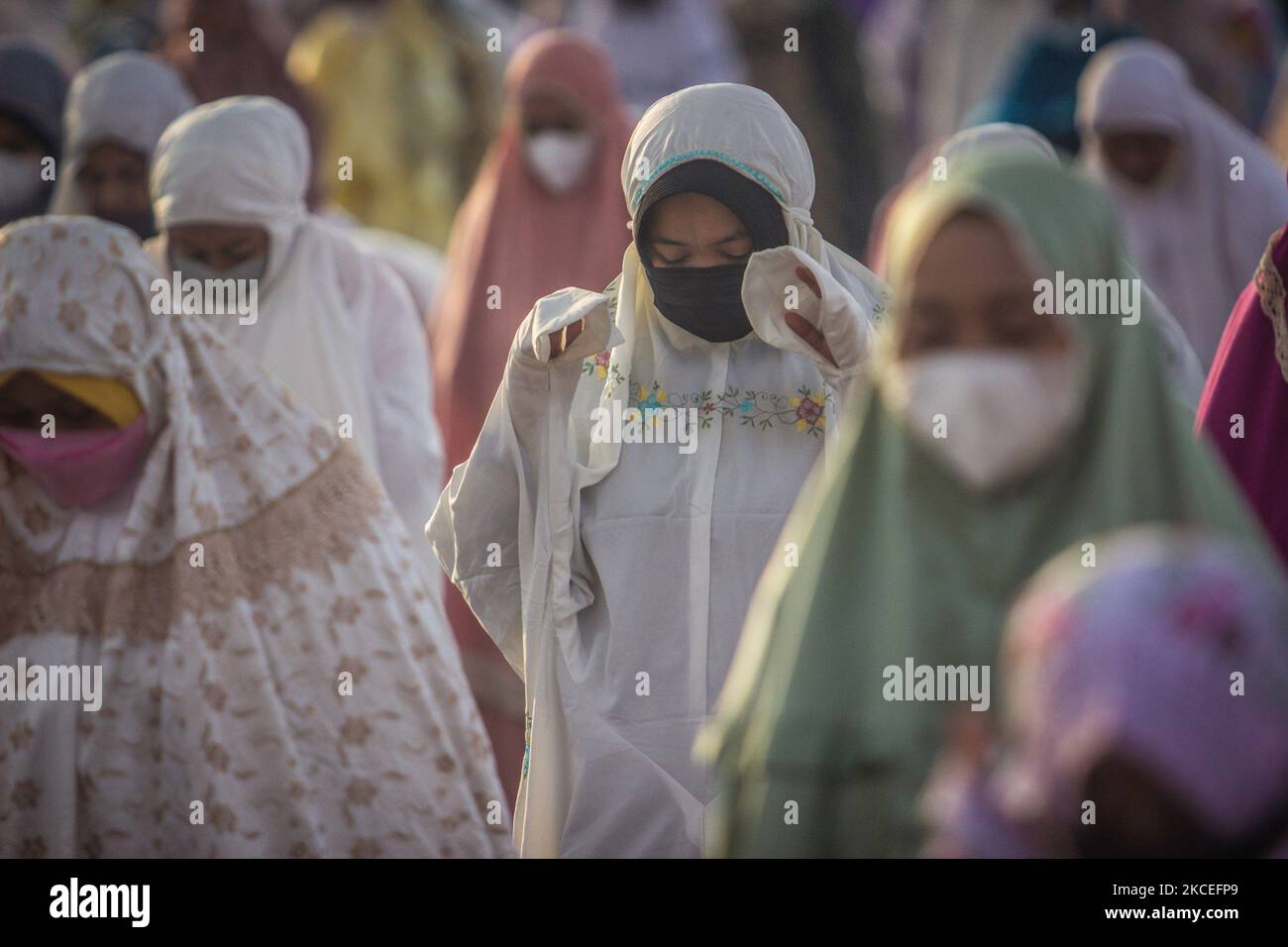 Indonesian muslims attend the Eid el-Fitr prayer at the Great Mosque on May 13, 2021 in Semarang, Central Java Province, Indonesia. (Photo by WF Sihardian/NurPhoto) Stock Photo