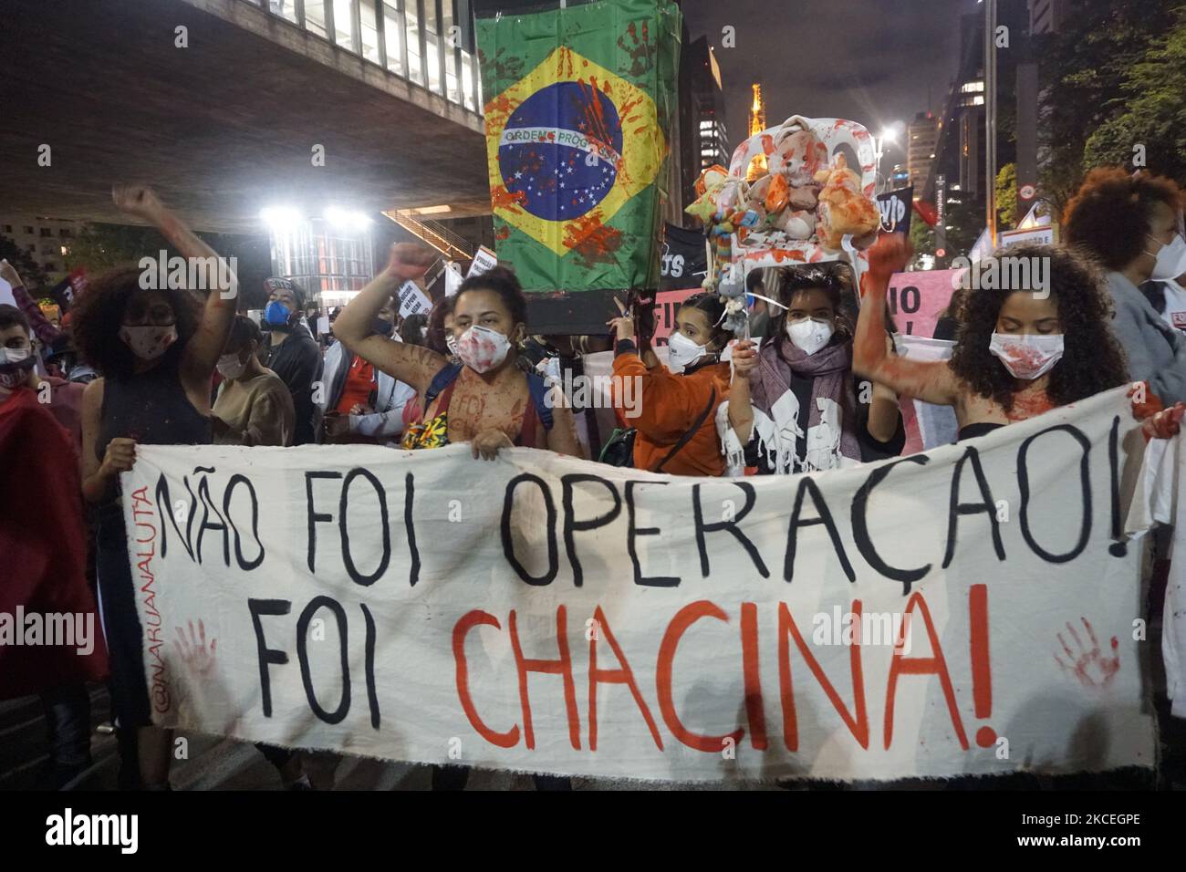 People take part in a protest during the National Day Against Racism