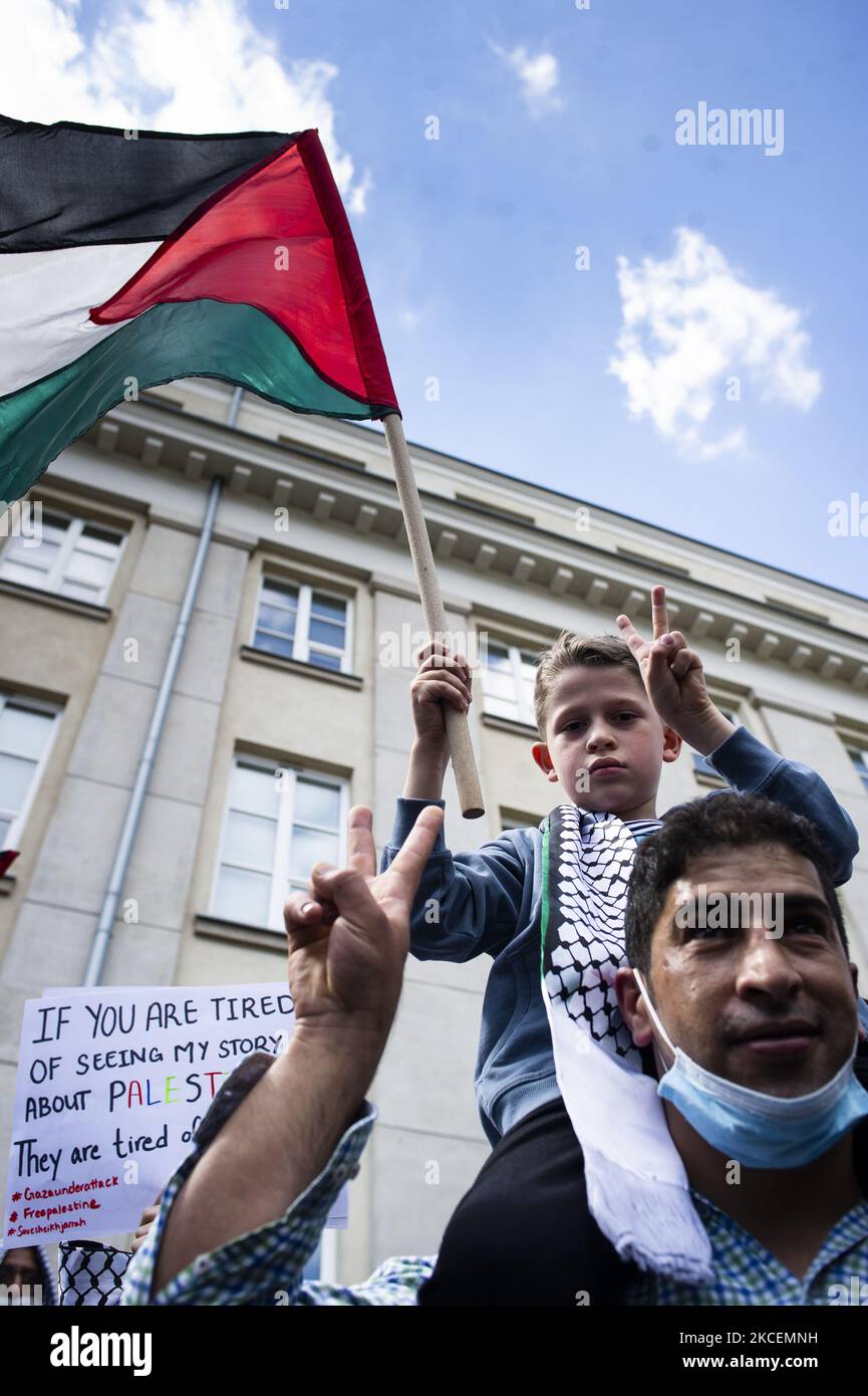 Palestinians and Poles (mostly from unions, left-wing organizations or anarchists) gathered in Warsaw, Poland, on May 15, 2021 in a protest against Israel aggression in Gaza and West Bank. The protest took place opposite to the Embassy of Israel in Poland and gathered around 200 participants. Protesters named Israel activities as a 'modern apartheid' and 'genocide, not a conflict', as well raised slogans of free Palestine. (Photo by Piotr Lapinski/NurPhoto) Stock Photo