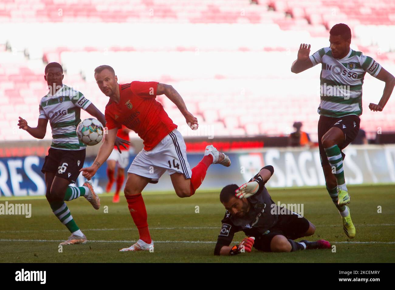 SL Benfica Forward Haris Seferovic battle for the ball with Antonio Adán goalkeeper of Sporting CP during the Liga NOS match between SL Benfica and Sporting CP at Estadio da Luz on 15th May, 2021 in Lisbon, Portugal. (Photo by Valter Gouveia/NurPhoto) Stock Photo