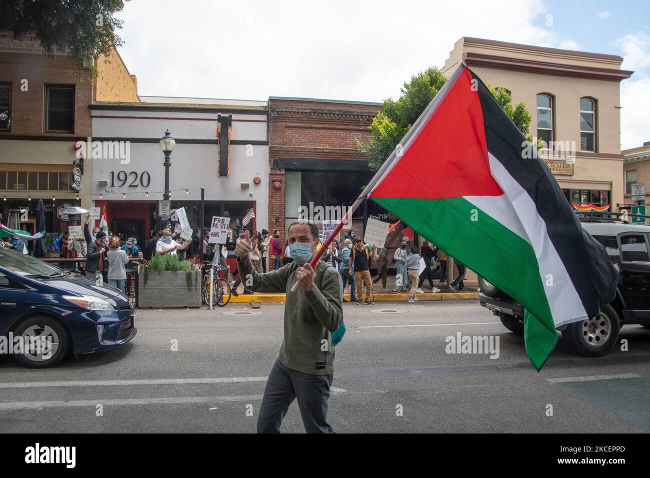Residents of San Luis Obispo, California marched through the city calling for an end to Israeli apartheid and ethnic cleansing of Palestinians on May 16, 2021, a day after the 73rd anniversary of Nakba, or 'the catastrophe,' where in 1948, hundreds of Palestinian villages were destroyed, displacing 700,000 Palestinians from their homeland as Israel gained statehood. (Photo by Adam J. Dewey/NurPhoto) Stock Photo