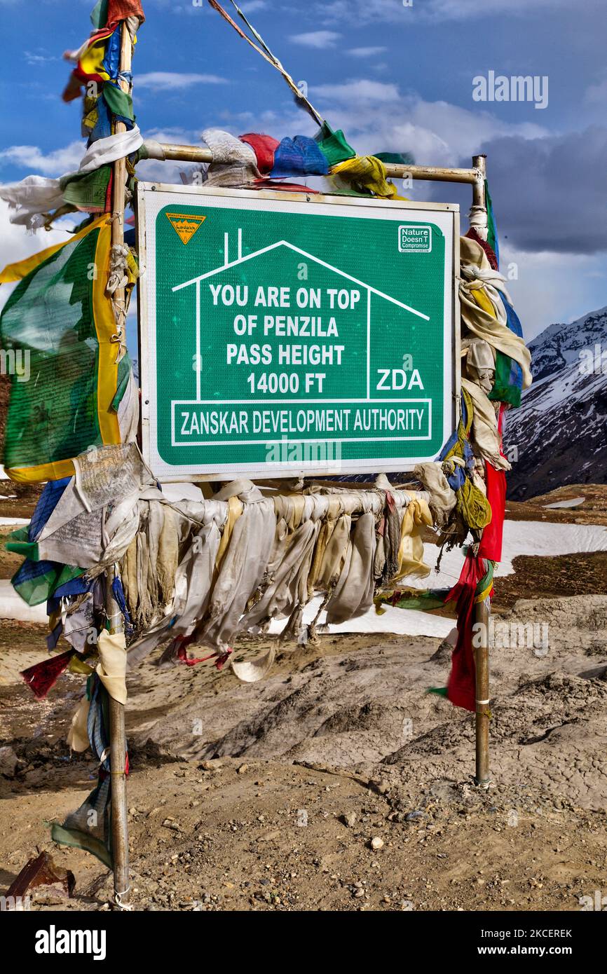 Sign at the top of the Panzila pass (Panjila pass) in the Suru Valley in Zanskar, Ladakh, Jammu and Kashmir, India. The Panzilla Pass is the highest point between Kargil and Padam. Panzilla pass separates the Suru Valley from the Zanskar Valley and is known as the Gateway to Zanskar. The Panzila pass is located at an elevation of 4,400 m (14,436 ft) above sea level and connects the Suru Valley region to the Zanskar Valley region. (Photo by Creative Touch Imaging Ltd./NurPhoto) Stock Photo