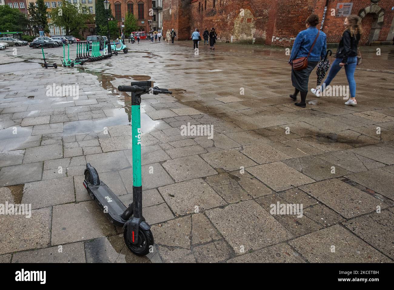 Electric kickscooters belonging to the Bolt scooters sharing company parkedin the city center