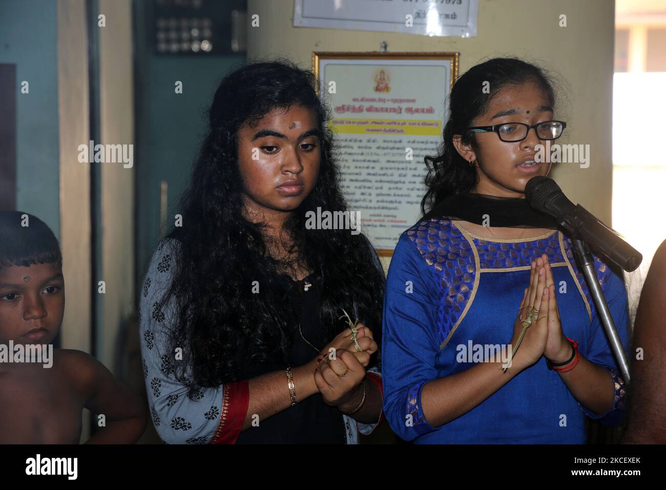 Tamil Hindu devotees sing special prayers during the 108 ...