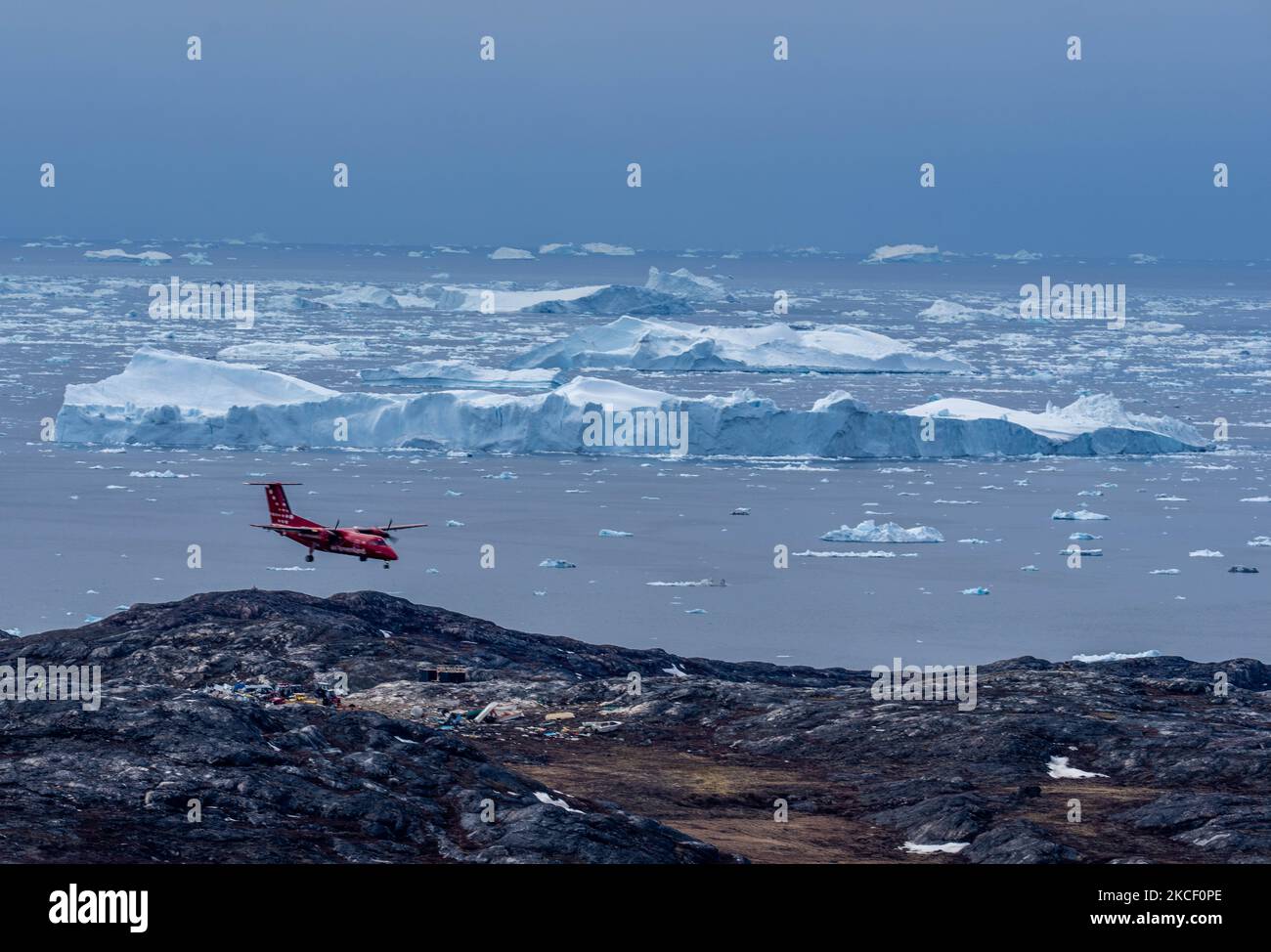 Icebergs near Ilulissat, Greenland. Climate change is having a profound ...
