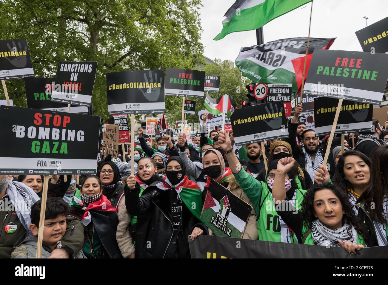 LONDON, UNITED KINGDOM - MAY 22, 2021: Tens of thousands of protesters gather in central London for a demonstration in support of Palestine, on 22 May, 2021 in London, England. A ceasefire between Israel and Palestine came into force on Friday following 11 days of air strikes that left more than 250 dead as conflict escalated over planned evictions of Palestinian families from their homes by Jewish settlers in the Sheikh Jarrah district of East Jerusalem and clashes with security forces around the Old City during Ramadan. (Photo by WIktor Szymanowicz/NurPhoto) Stock Photo