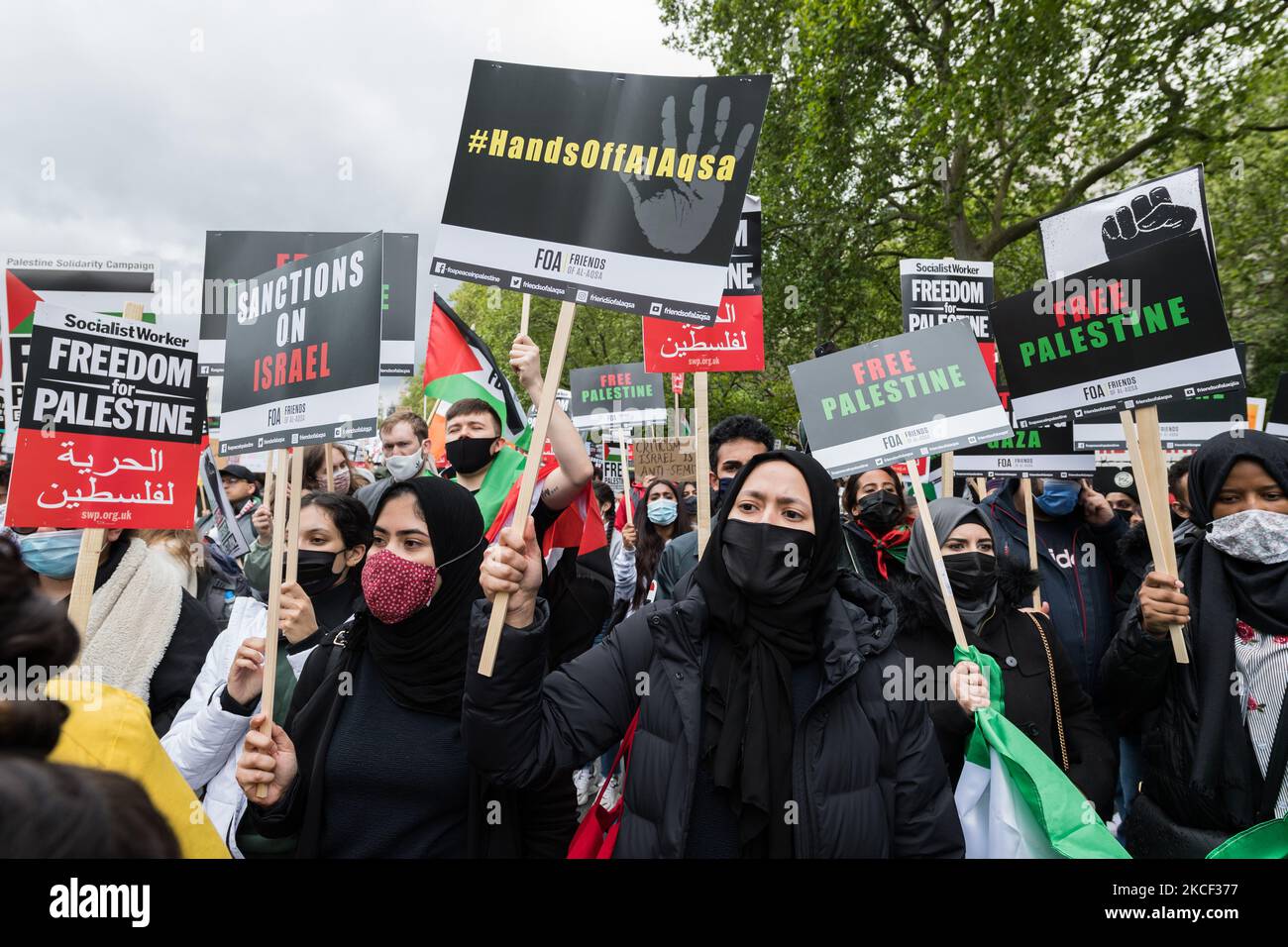 LONDON, UNITED KINGDOM - MAY 22, 2021: Tens of thousands of protesters gather in central London for a demonstration in support of Palestine, on 22 May, 2021 in London, England. A ceasefire between Israel and Palestine came into force on Friday following 11 days of air strikes that left more than 250 dead as conflict escalated over planned evictions of Palestinian families from their homes by Jewish settlers in the Sheikh Jarrah district of East Jerusalem and clashes with security forces around the Old City during Ramadan. (Photo by WIktor Szymanowicz/NurPhoto) Stock Photo