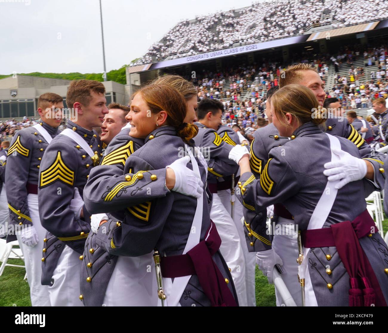 West Point graduates embrace after the conclusion of the 2021 West