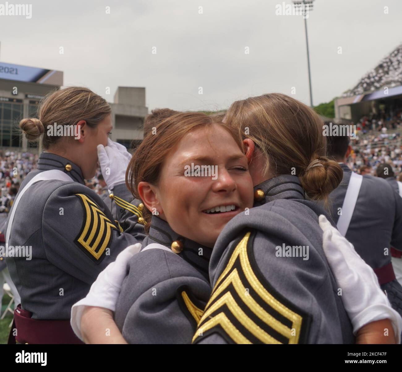 West Point graduates embrace after the conclusion of the 2021 West