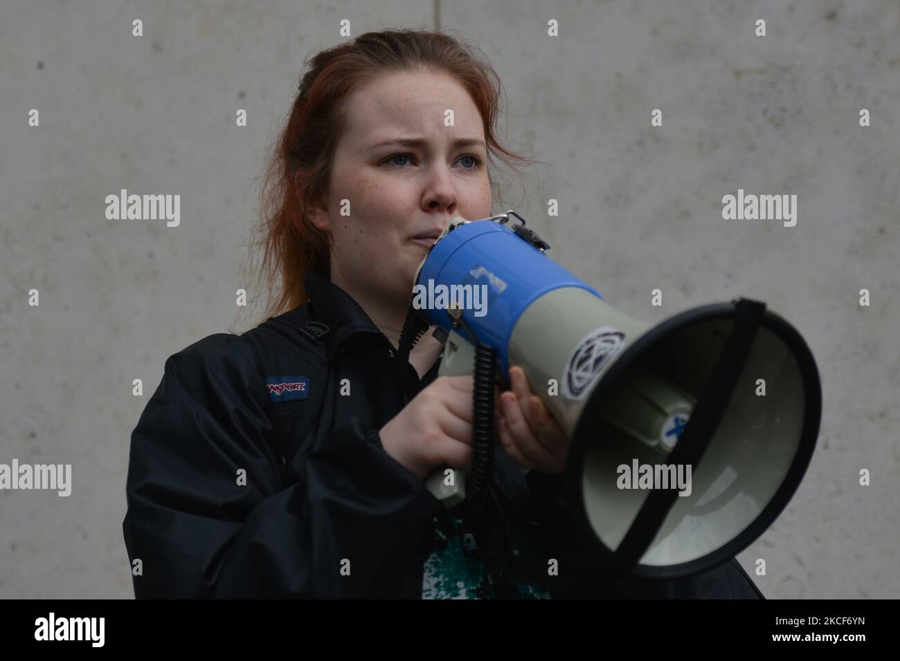 Orla Murphy, addresses the media outside the Criminal Court of Justice in Dublin. Extinction Rebellion activists staged a theatrical protest on the steps of the Criminal Court of Justice in Dublin to show the injustice of climate inaction as 20-year-old Orla Murphy, a climate activist, appears in court for criminal damages. On Tuesday, May 25, 2021, in Dublin, Ireland. (Photo by Artur Widak/NurPhoto) Stock Photo