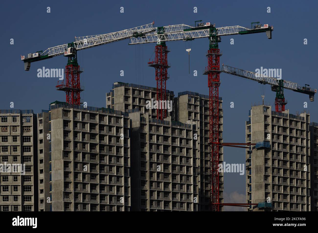 A general view of a high-rise residential flats under construction on May 28, 2021 in Singapore. Singapore enters a month long heightened alert from May 16 to June 13 to curb the spread of COVID-19 cases in the local community. New restrictions on movements and activities have been introduced such as limiting social interaction to two, prohibiting dining out and a reduced operating capacity at shopping malls, offices and attractions. On May 17, the construction industry stakeholders appealed to Multi-Ministry Taskforce to bring in foreign workers in a safe and controlled manner after the built Stock Photo