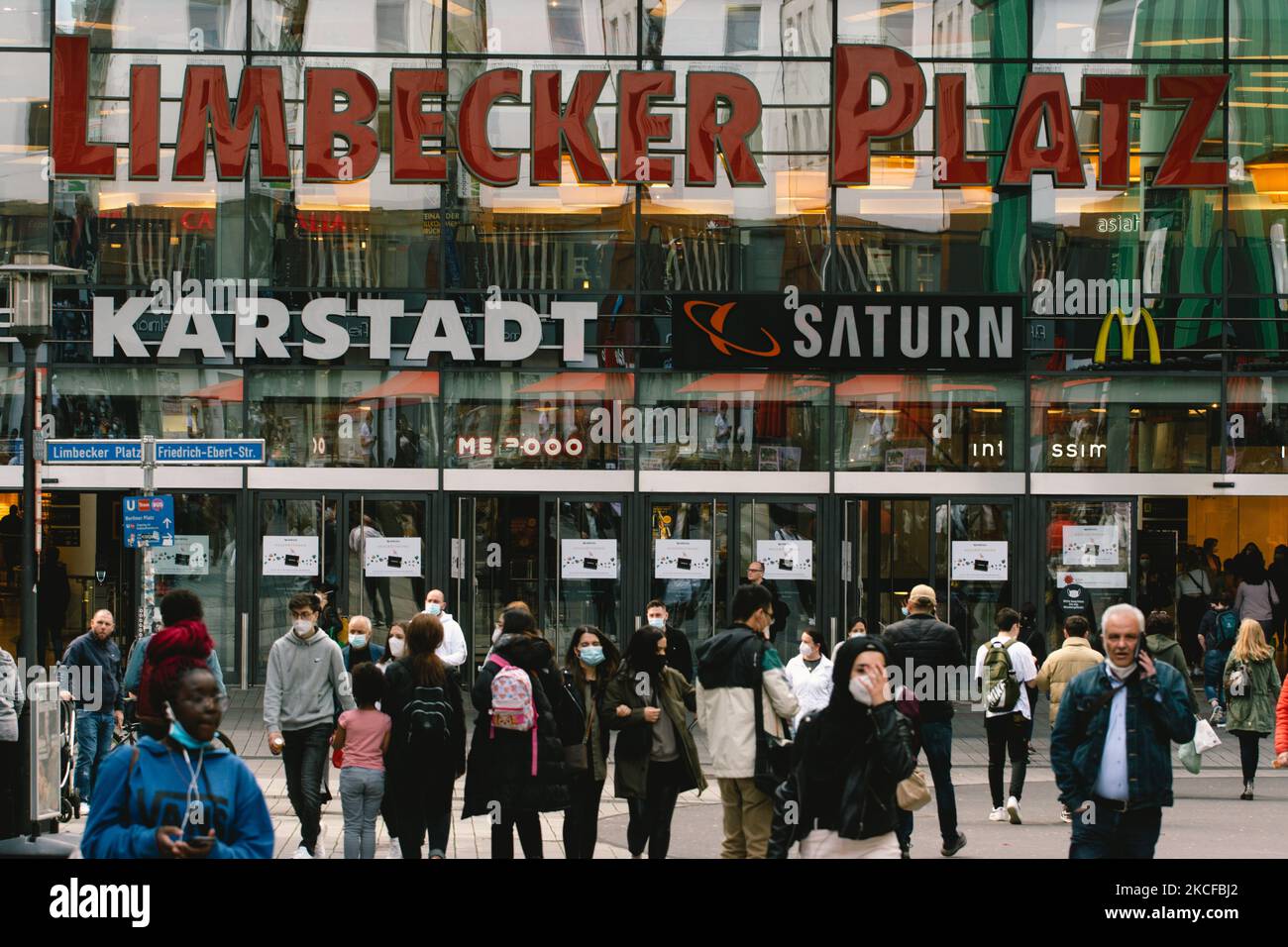 People walks in front of shopping center Limbecker Platz in Essen, Germany on May 28, 2021 as Germany relaxes measures due to decreasing infection cases (Photo by Ying Tang/NurPhoto) Stock Photo