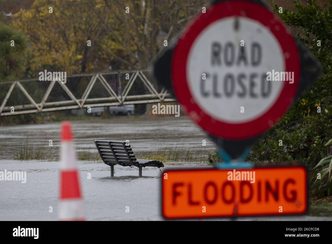 A bench sits amongst the flood waters in Christchurch, NewÂ Zealand on
