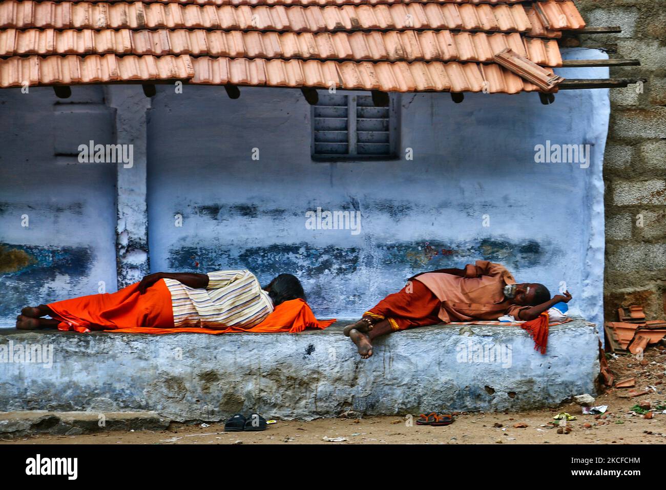 Hindu sages sleep near the Ganesh (Pillaiyar) Temple in Palani (Pazhani), Tamil Nadu, India. (Photo by Creative Touch Imaging Ltd./NurPhoto) Stock Photo
