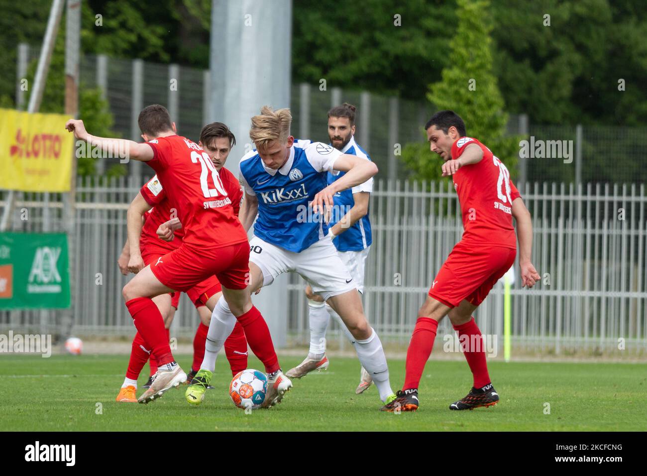 Christian Rusch (left) of Drochtersen/assel, Ted Tattermusch (middle) of SV Meppen and Oliver Ioannou of SV Drochtersen/Assel (right) battle for the ball during the lower saxony cup final between SV Drochtersen/Assel and SV Meppen at Eilenriedestadium on May 29, 2021 in Hanover, Germany. (Photo by Peter Niedung/NurPhoto) Stock Photo