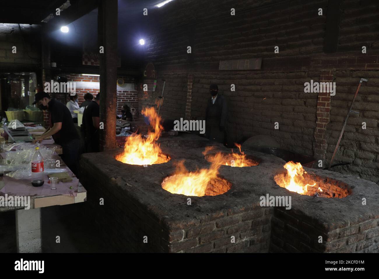 Kitchen and artisan ovens in the tourist area of El Pica 1, located in Texcoco, State of Mexico, during the COVID-19 health emergency and the yellow epidemiological traffic light in the municipality. (Photo by Gerardo Vieyra/NurPhoto) Stock Photo