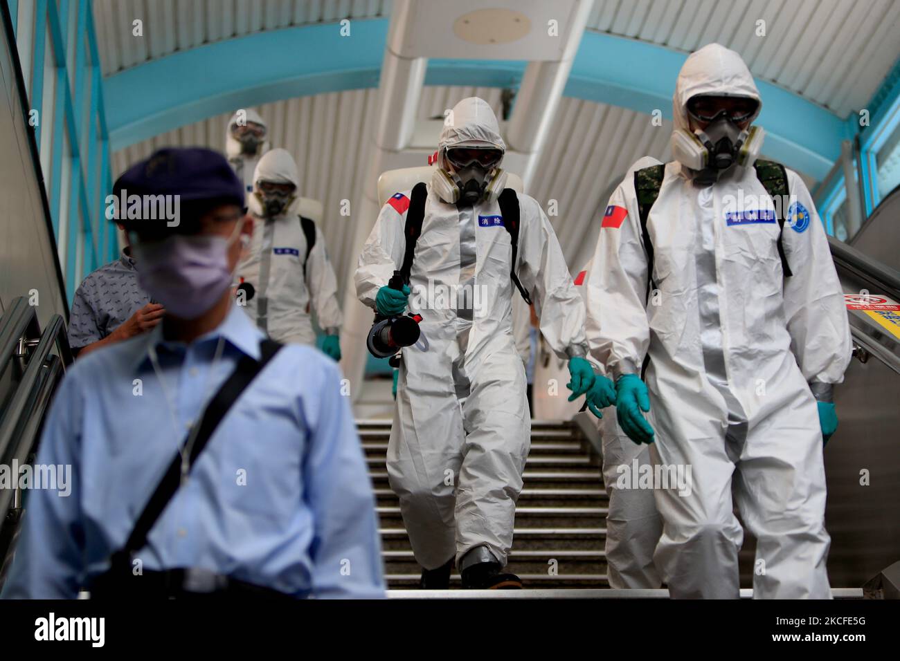 Chemical troops disinfect places and transport in Taipei and other places, following a surge of domestic COVID-19 cases and related deaths, in Taipei, Taiwan, 31 May 2021. The country also faces a shortage of isolation ward, ICU medical workers and vaccines amid community transmission. (Photo by Ceng Shou Yi/NurPhoto) Stock Photo