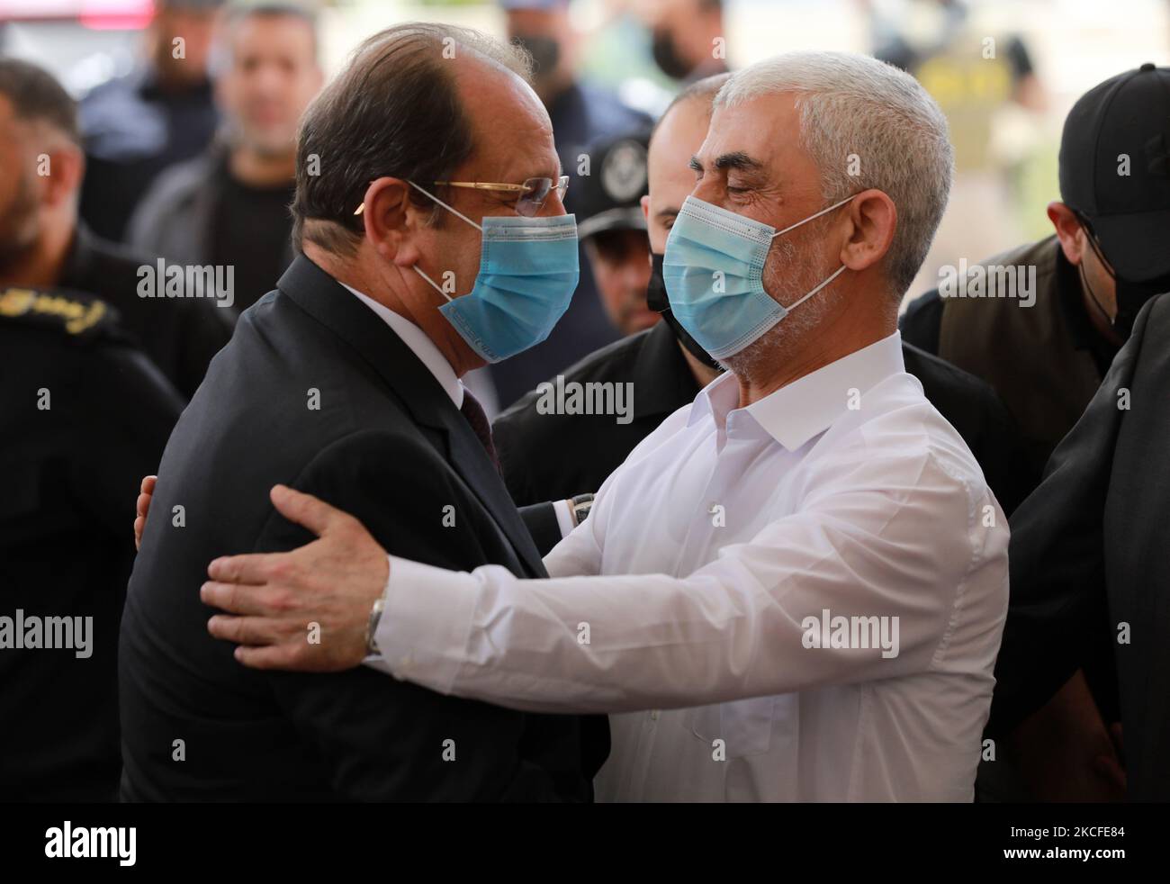 Yahya Sinwar (R), Hamas' political chief in Gaza, embraces General ...