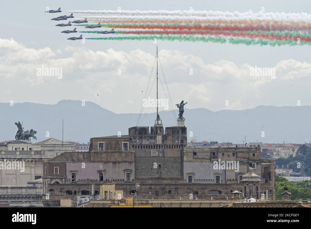 The Italian three-color special air force acrobatic team 'Frecce Tricolori' flies over Rome and the Vatican Wednesday, June 2, 2021, as Italy celebrates the anniversary of its unification. (Photo by Massimo Valicchia/NurPhoto) Stock Photo