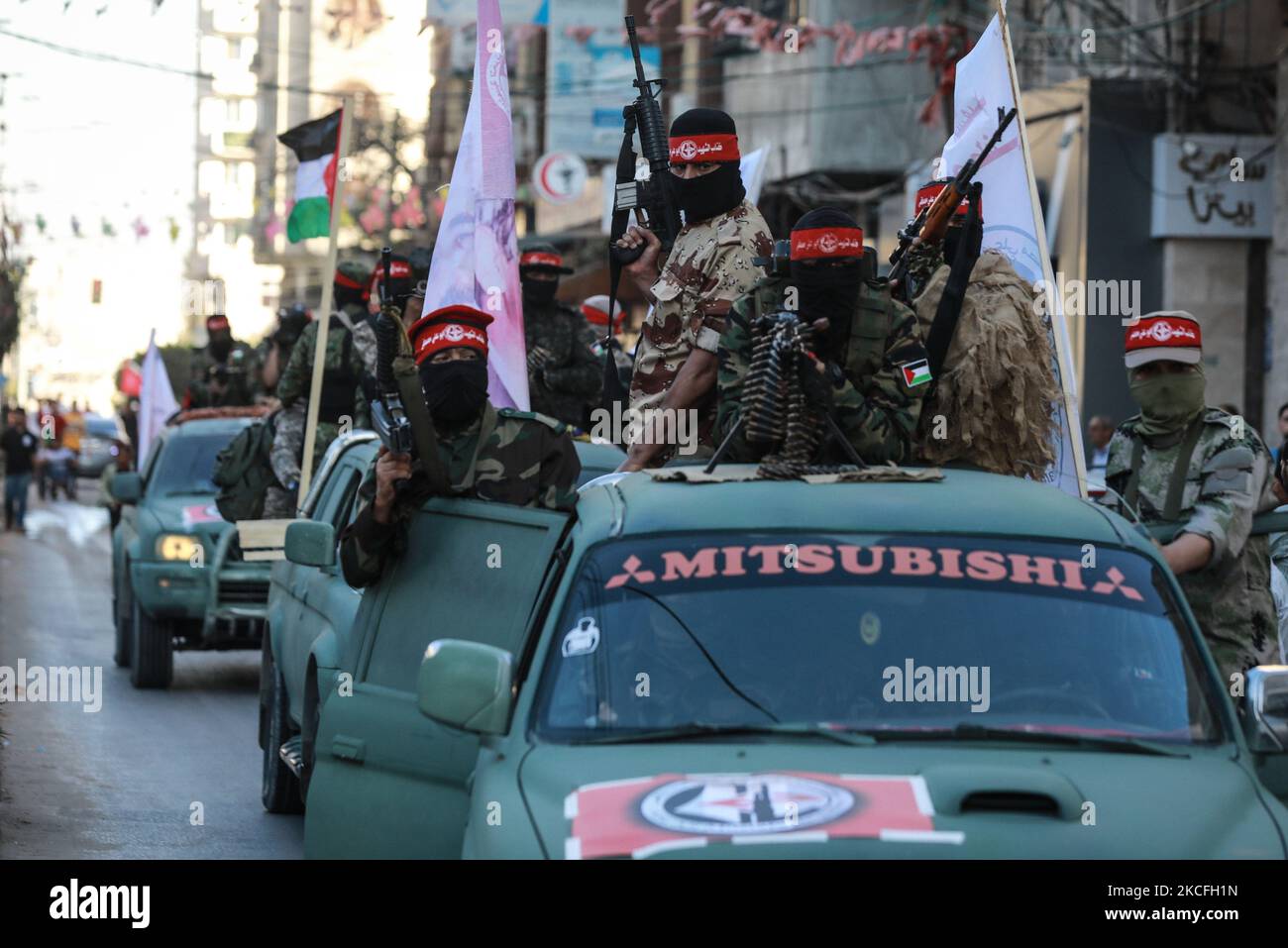 Masked Palestinian gunmen of the Popular Front for the Liberation of Palestine (PFLP) march during a parade in the streets of Gaza City on June 2, 2021, more than a week after a ceasefire brought an end to 11 days of hostilities between Israel and Hamas. (Photo by Majdi Fathi/NurPhoto) Stock Photo