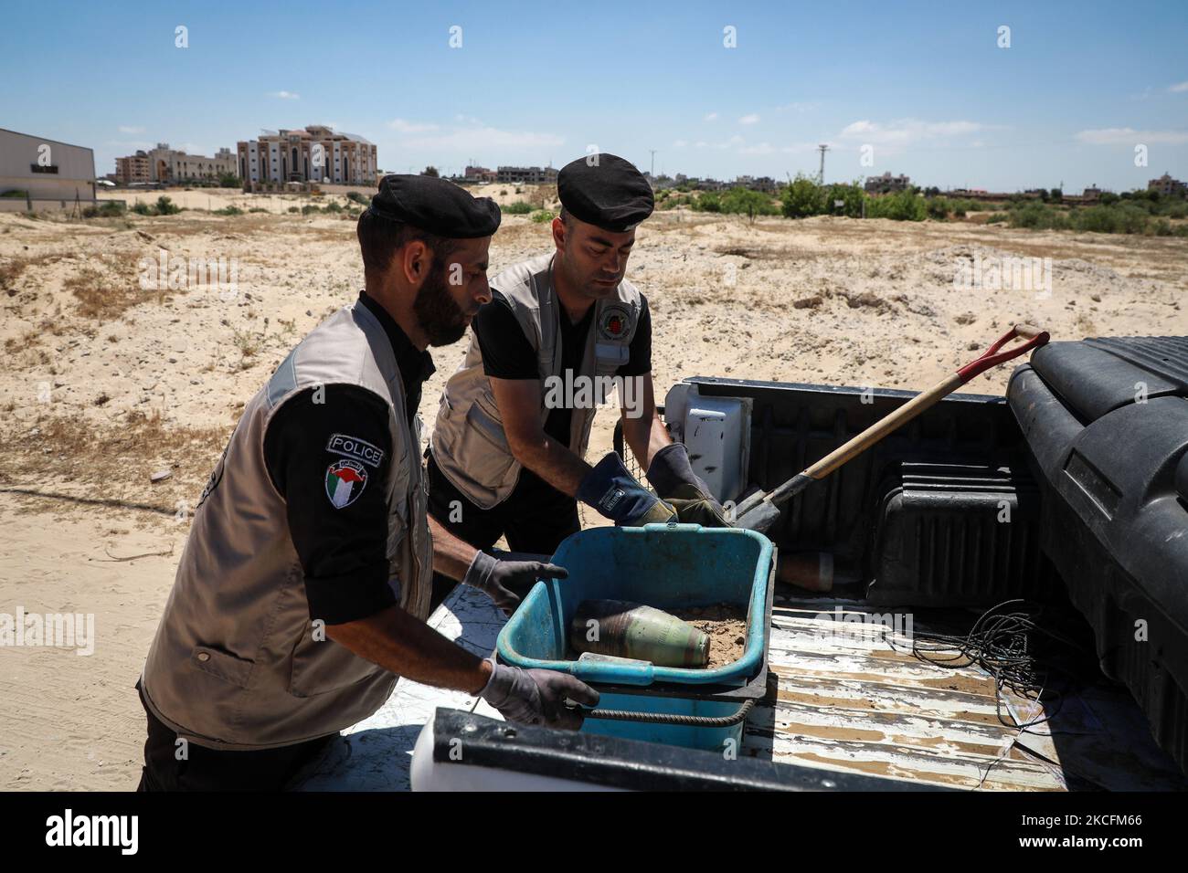 Explosives experts of Hamas stow away in the back of a vehicle a collected unexploded projectile from the aftermath of the May 2021 conflict with Israel, in Khan Yunis in the southern Gaza Strip on June 5, 2021. (Photo by Majdi Fathi/NurPhoto) Stock Photo