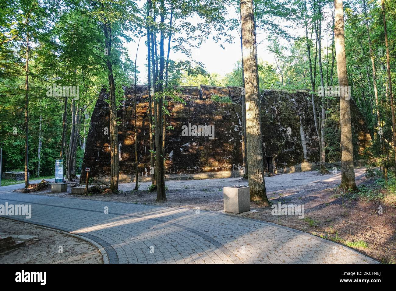 People visiting the WWII era Adolf Hitler's quarters hidden in a forest near Gierloz, Poland, are seen on 2 June 2021 r Wolf's Lair (ger. Wolfsschanze) ruins of Adolf Hilter's war headquarters was a hidden town in the woods consisting of 200 buildings: shelters, barracks, 2 airports, a power station, a railway station, air-conditioners, water supplies, heat-generating plants and two teleprinters (Photo by Michal Fludra/NurPhoto) Stock Photo