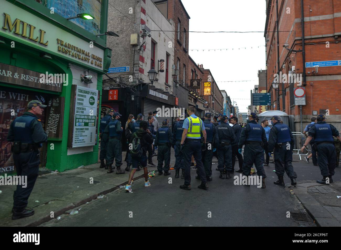Members of Gardai enforcing coronavirus restrictions and relocating people from Temple Bar in Dublin. On Sunday, 6 June 2021, in Dublin, Ireland. (Photo by Artur Widak/NurPhoto) Stock Photo