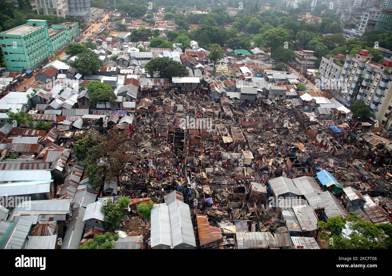 At least 500 shanties were gutted as a slum in Mohakhali area in Dhaka, Bangladesh, caught fire on June 7, 2021.The fire started at Mohakhali Sattola slum around 3:40am, said Fire Service director general Brigadier General Sazzad Hossain.On information, 18 firefighting units rushed to the spot and brought the fire under control around 6:35am, he said.A four members committee was formed to investigate the incident.Illegal gas or power connection is primarily suspected as reason behind the fire. (Photo by Sony Ramany/NurPhoto) Stock Photo
