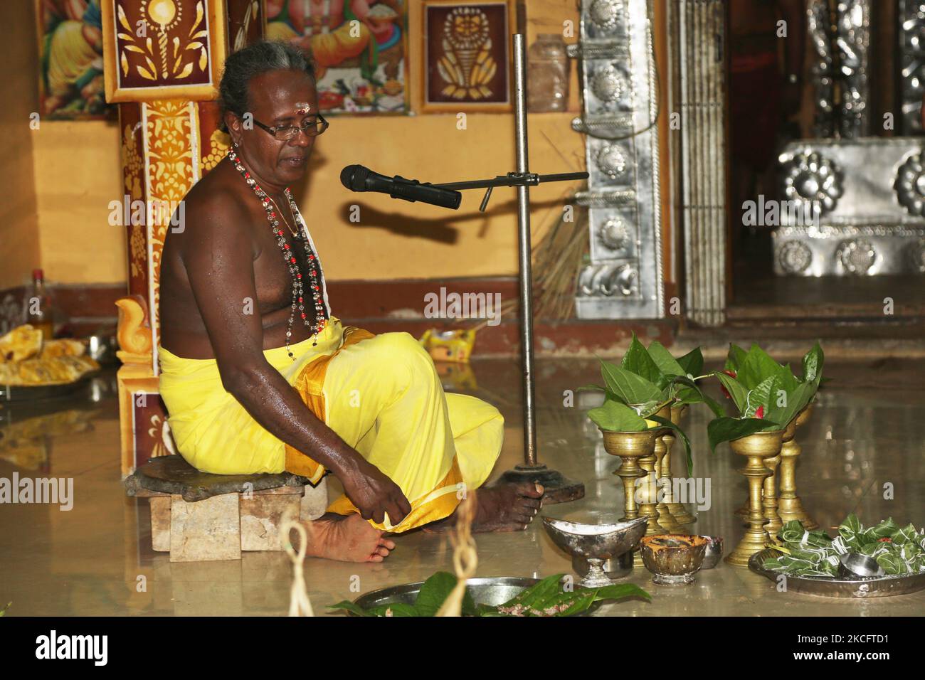 Tamil Hindu priest recites special prayers during the 108 abhishekam pooja honouring Lord Vinayagar (Lord Ganesh) at the Arasadi Vinayagar Temple (Arasadi Sithi Vinayagar Kovil) in Jaffna, Sri Lanka. (Photo by Creative Touch Imaging Ltd./NurPhoto) Stock Photo