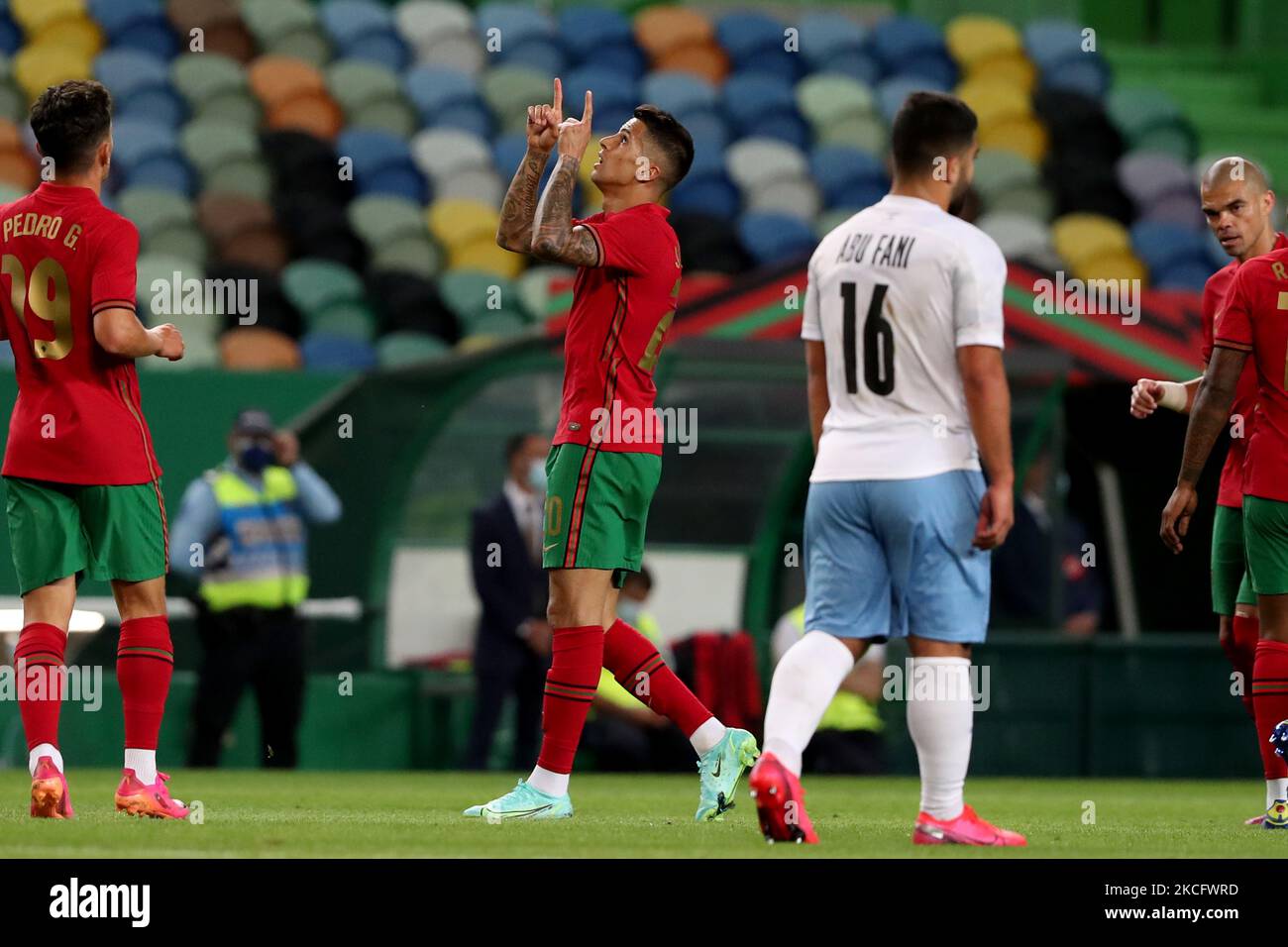 joao-cancelo-of-portugal-c-celebrates-after-scoring-a-goal-during