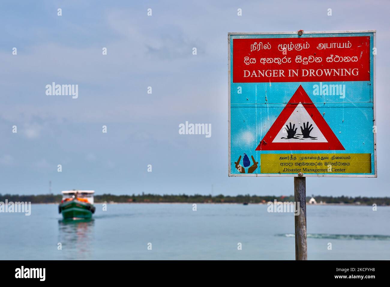 Warning sign about the danger of drowning at Kurikadduwan harbour in
