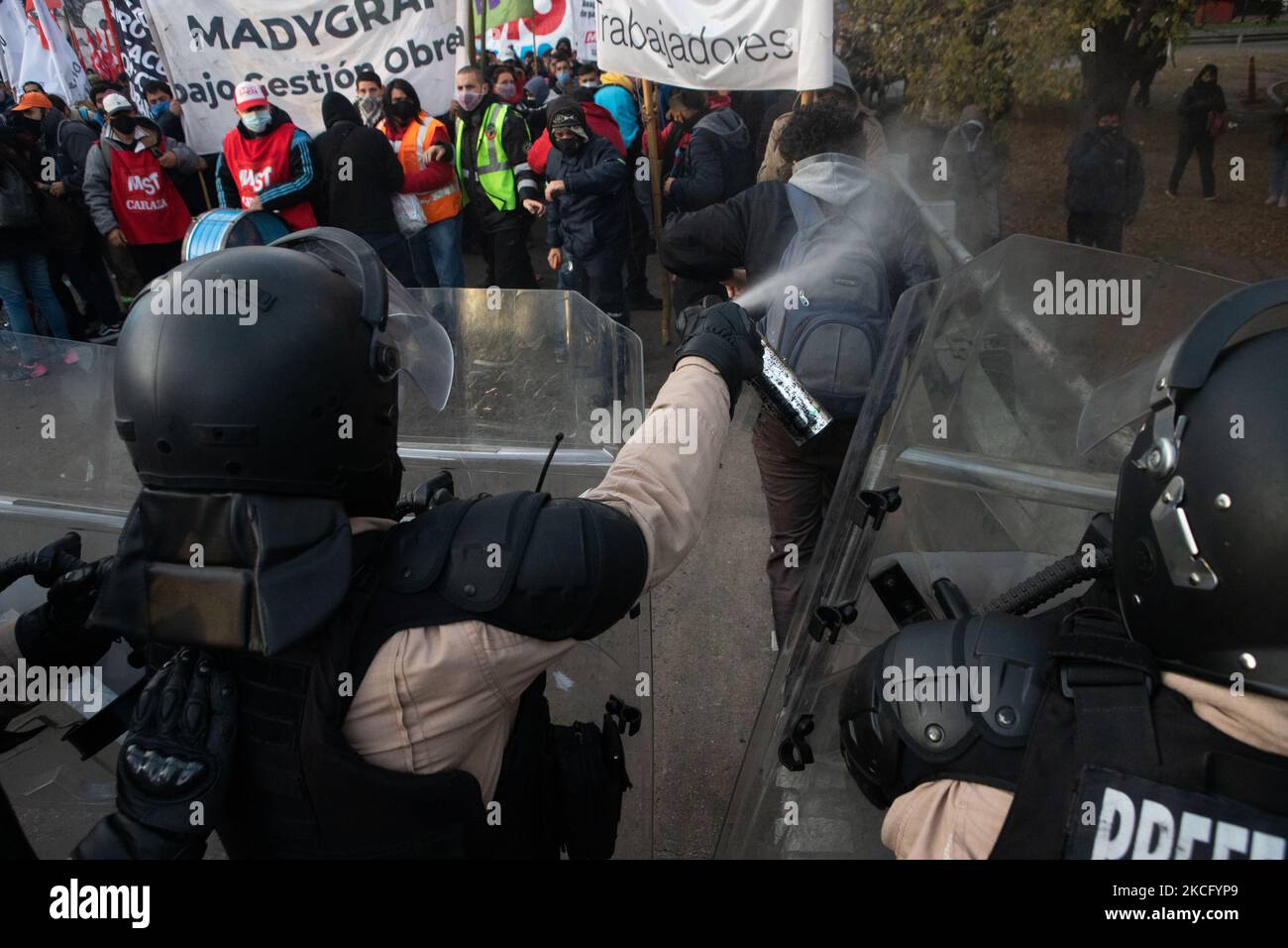 Demonstrators clash with riot police during a protest held by people who were fired during the covid-19 pandemic in Buenos Aires, Argentina, June 11, 2021. (Photo by Matías Baglietto/NurPhoto) Stock Photo