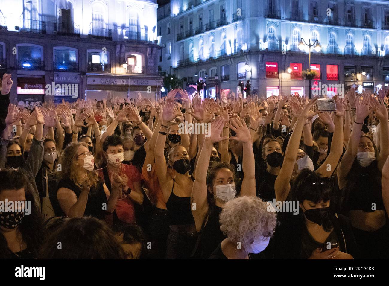 Feminist rally in repudiation of feminicides at Puerta del Sol in Madrid, Spain, on June 11, 2021, under the slogans: ''Ni una menos'' (Not one less); ''Si nos tocan a una nos tocan a todas'' (If they touch one of us, they touch us all) and ''Vivas nos queremos'' (Alive we love each other). A candlelight vigil was held in remembrance of the women and children murdered victims of gender violence (Photo by Alvaro Laguna/NurPhoto) Stock Photo