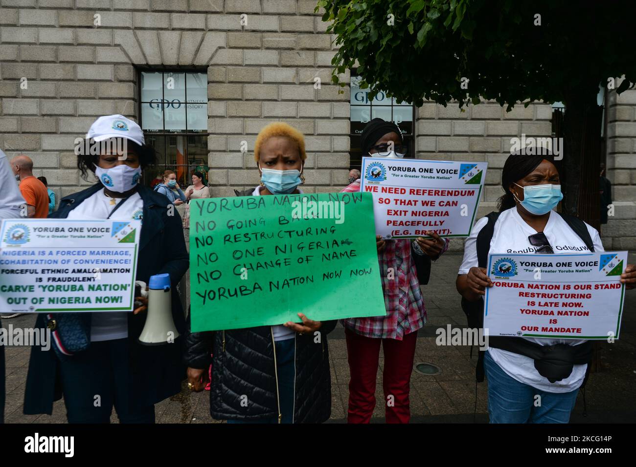 Members of the local Nigerian diaspora seen in front of the GPO in Dublin during a global 'Yoruba One Voice' protest. On Saturday, June 12, 2021, in Dublin, Ireland. (Photo by Artur Widak/NurPhoto) Stock Photo