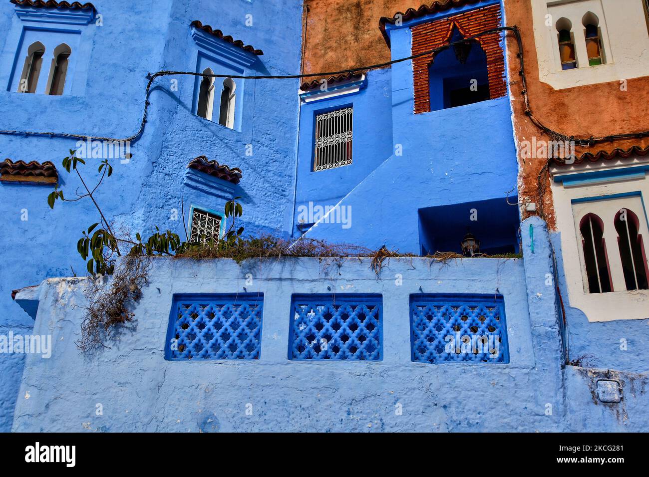 Buildings in city of Chefchaouen located in the Rif Mountains in Morocco, Africa. Chefchaouen (also called Chaouen) is known as the 'Blue City' due to the fact that many of its buildings are painted blue in colour, which is said to symbolize the sky and heaven, and serve as a reminder to lead a spiritual life. (Photo by Creative Touch Imaging Ltd./NurPhoto) Stock Photo