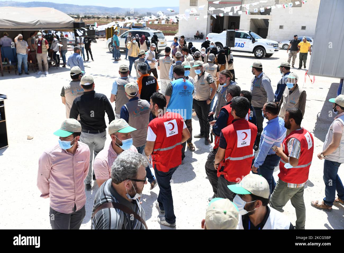 The Syrian Expatriates Medical Association ''Sima'' opened the first two mobile health centers in Idlib, Syria, on June 15, 2021 in the presence of Dr. ''Ahmed Samer Al-Esh'' CEO of Sima, Mr. ''Kadir Kemaloglu'' coordinator of the Turkish Red Crescent in Idlib, and Mr. ''Arjan Akar'', director of AFAD in the Turkish state of Hatay Mr. ''Ismail Yeket'' the official of the Turkish Religious Endowment, and Dr. ''Salem Abdan'' the director of Idlib Health. Stock Photo