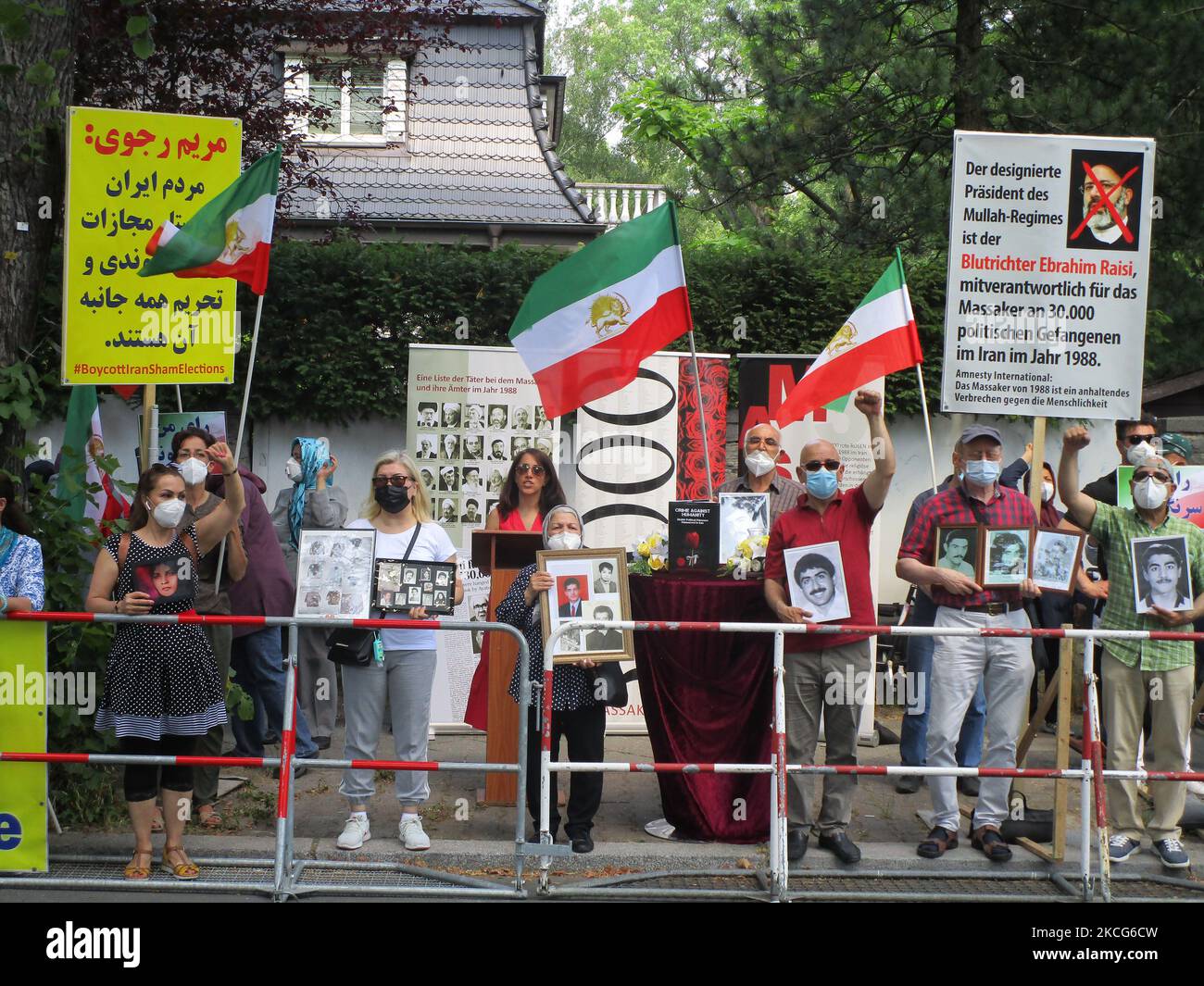 On the eve of the Iran Presidential Election in Iran, Iranian supporters of the NCRI, the main Iranian opposition group, protest outside the Iranian Embassy in Berlin, Germany in June 17, 2021. The protesters have called for the boycott of the election in Iran and condemn Ebrahim Raisi, the expected next Iran President for the massacre of 30,000 political prisoners in 1988. (Photo by Siavosh Hosseini/NurPhoto) Stock Photo