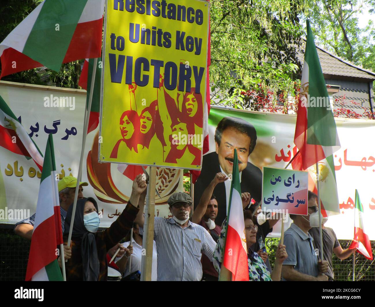 On the eve of the Iran Presidential Election in Iran, Iranian supporters of the NCRI, the main Iranian opposition group, protest outside the Iranian Embassy in Berlin, Germany in June 17, 2021. The protesters have called for the boycott of the election in Iran and condemn Ebrahim Raisi, the expected next Iran President for the massacre of 30,000 political prisoners in 1988. (Photo by Siavosh Hosseini/NurPhoto) Stock Photo