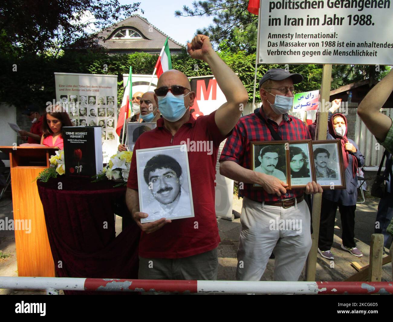 On the eve of the Iran Presidential Election in Iran, Iranian supporters of the NCRI, the main Iranian opposition group, protest outside the Iranian Embassy in Berlin, Germany in June 17, 2021. The protesters have called for the boycott of the election in Iran and condemn Ebrahim Raisi, the expected next Iran President for the massacre of 30,000 political prisoners in 1988. (Photo by Siavosh Hosseini/NurPhoto) Stock Photo