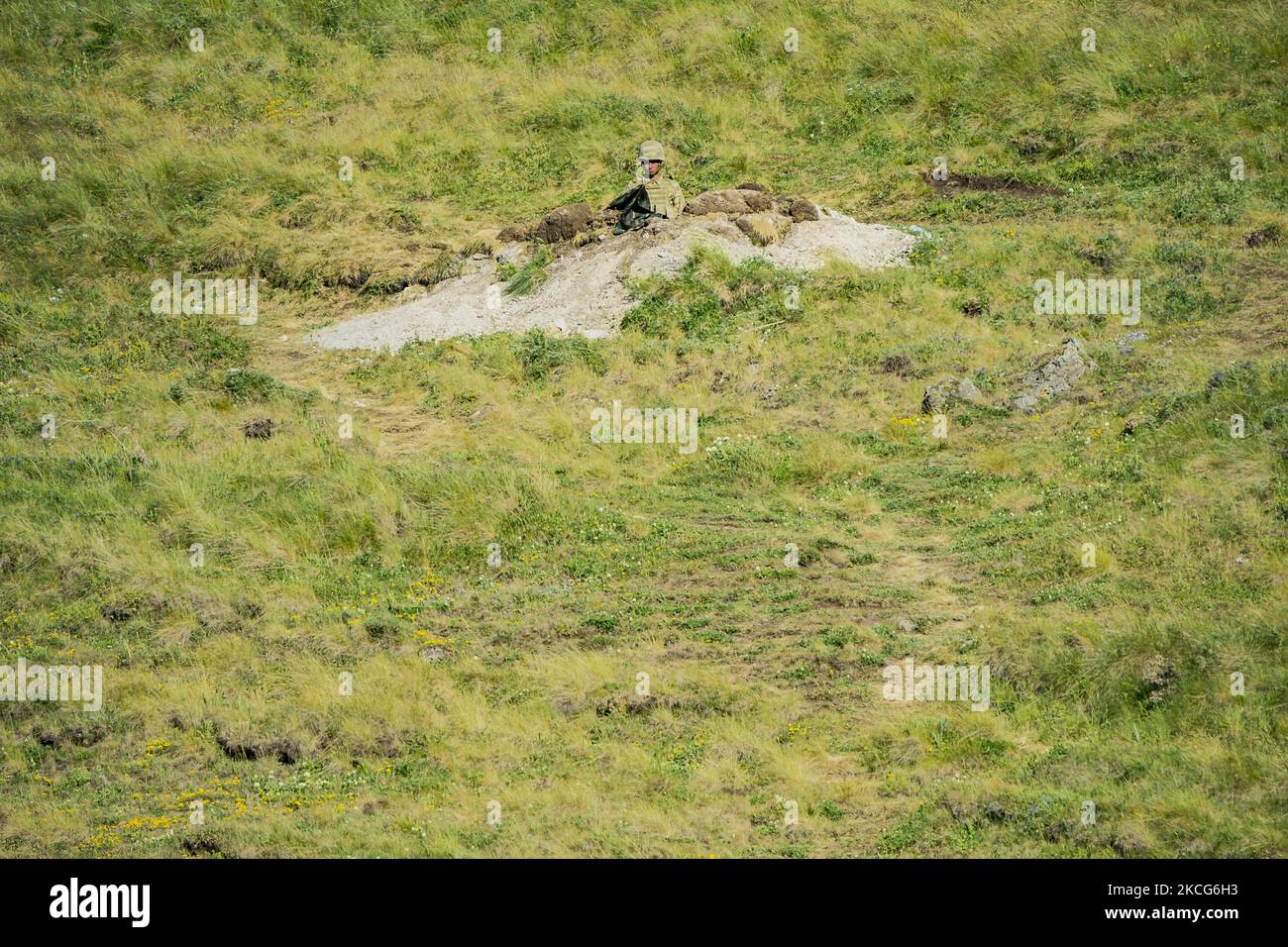 Azeri soldier in his trench in an advanced postion inside the armenian territory in the Gegharkunik province, Armenia. Azerbaijan army is interned some kilometers from the oficial border between Armenia and Azerbaijan. (Photo by Celestino Arce/NurPhoto) Stock Photo