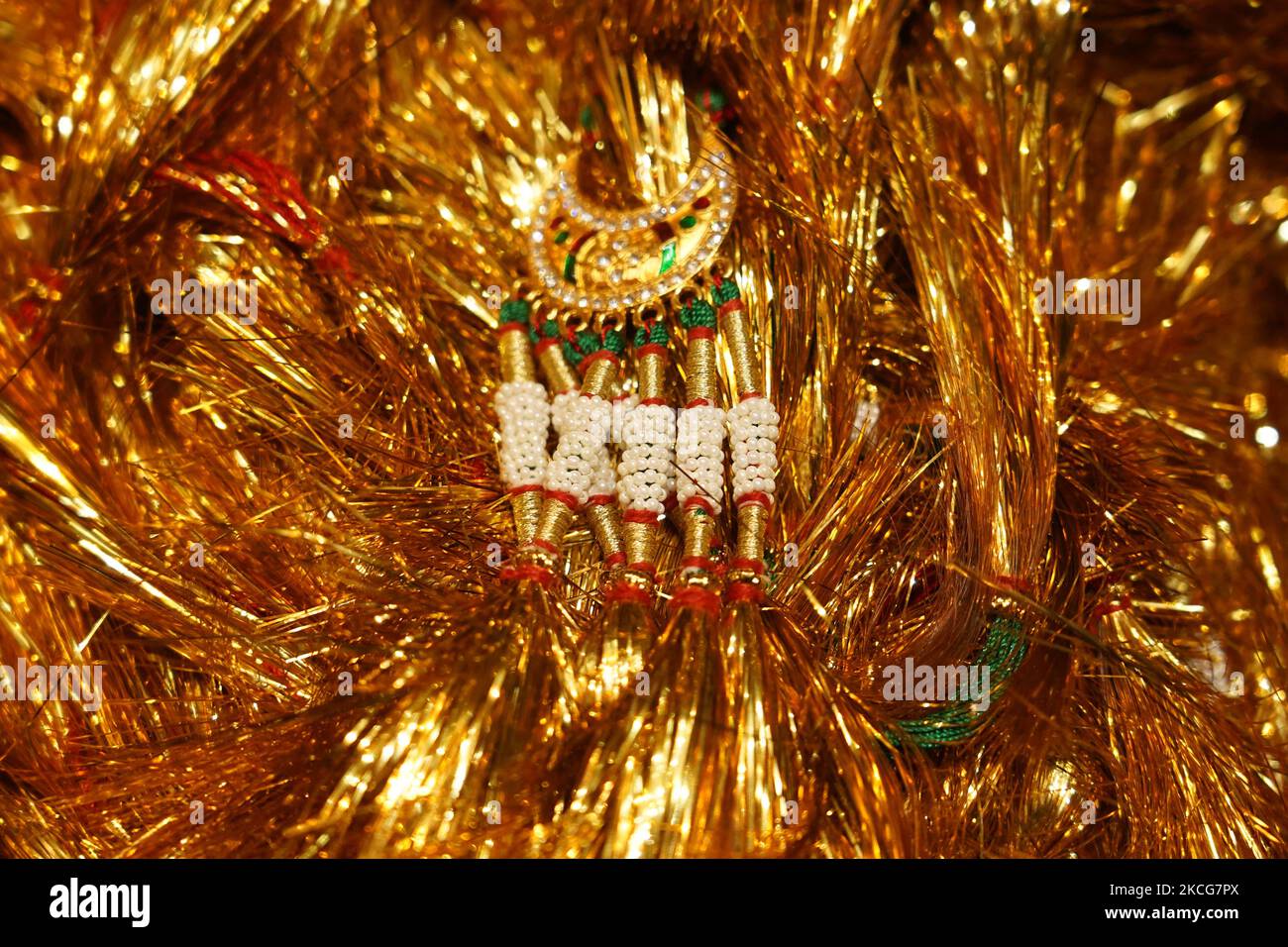 A Worker arrange Lanyard of (Bajuband) Armband in Ajmer, Rajasthan