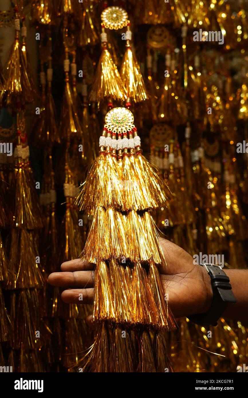 A Worker arrange Lanyard of (Bajuband) Armband in Ajmer, Rajasthan