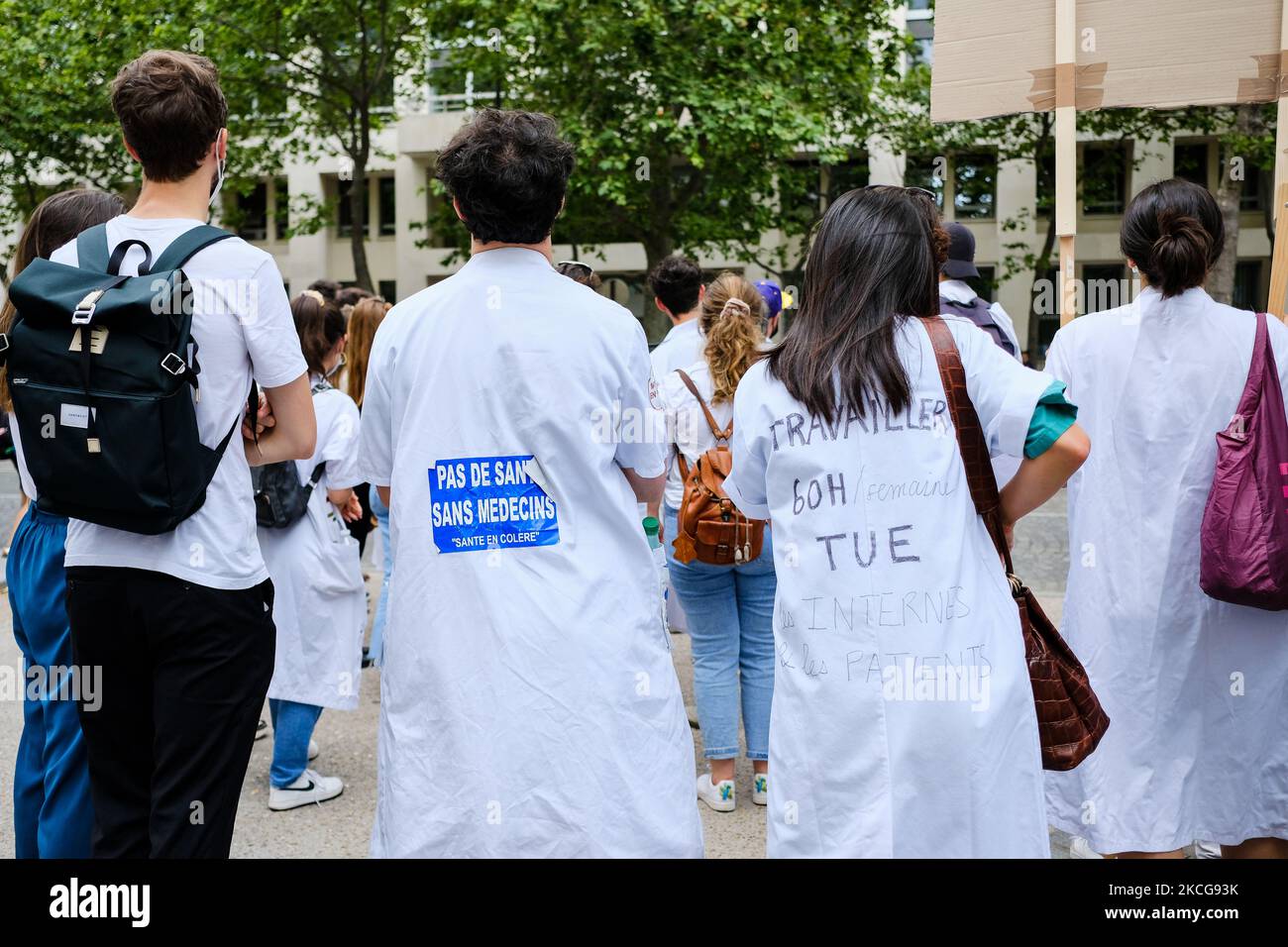 Medical interns workers demonstrate in Paris, France, on June 19, 2021 to demand the application of the law on the 48 hours of weekly work per week. They denounce their overexploitation and the many cases of suicide.(Photo by Vincent Koebel/NurPhoto) Stock Photo