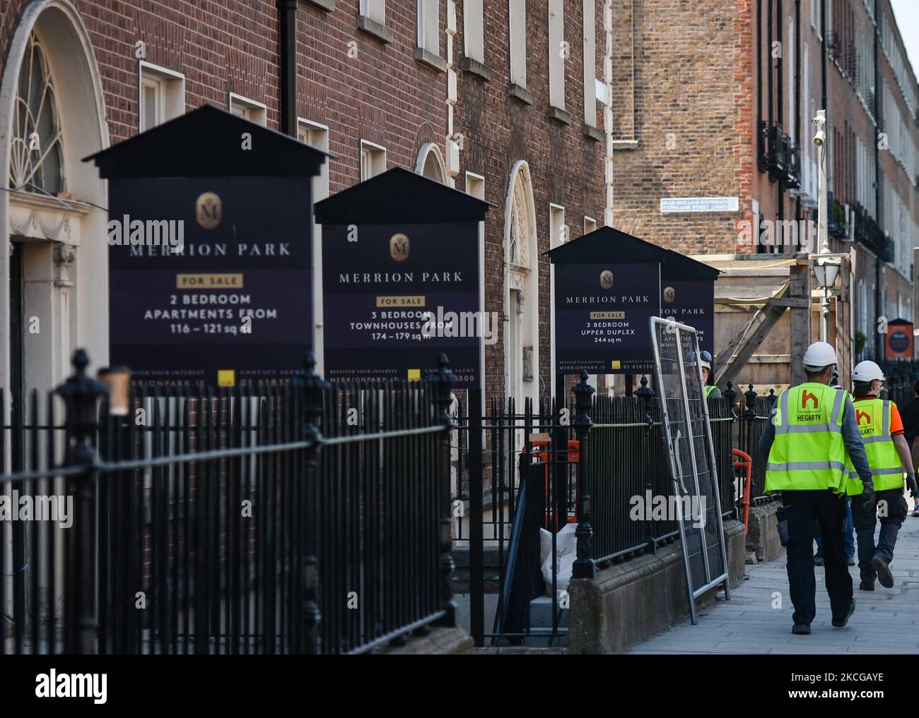 'FOR SALE' signs seen in front of renovated buildings in Dublin City