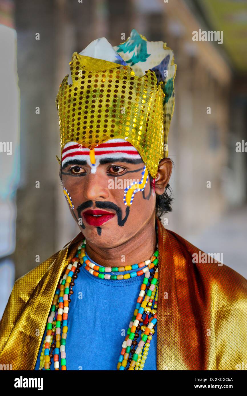 Young actors dressed as Hindu Gods prepare to reenact a drama at the